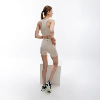 Жіночий Топ New Balance Essentials Reimagined Bra Бежевий XS (7dWB31500MBM XS) - 2 - Robinzon.ua