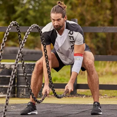 Фіксатор ліктя Reebok Speedwick Elbow Support білий, червоний Уні XL RRSU-14523 XL - 1 - Robinzon.ua