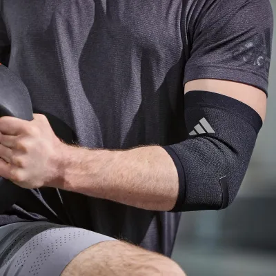 Фіксатор ліктя Adidas Performance Elbow Support чорний Уні S ADSU-13331 S - 1 - Robinzon.ua