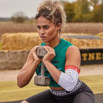 Фіксатор ліктя Reebok Speedwick Elbow Support білий, червоний Уні S RRSU-14523 S - 2 - Robinzon.ua