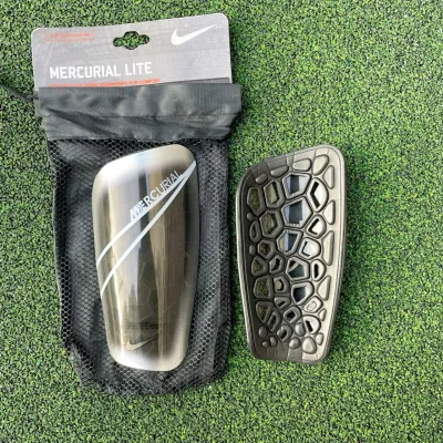 Футбольні щитки Nike Mercurial Lite - 1 - Robinzon.ua