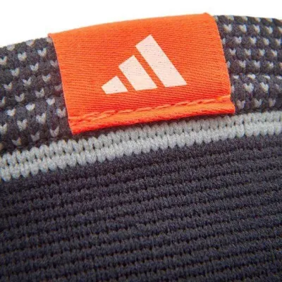 Фіксатор ліктя Adidas Elbow Support Чорний, Сірий M (ADSU-12532BK-NL) - 2 - Robinzon.ua