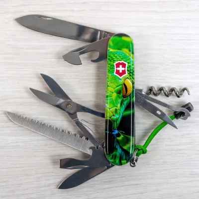 Складаний ніж Victorinox HUNTSMAN ZODIAC Зелена дерев'яна змія 1.3713.3.Z4310pk - 7 - Robinzon.ua