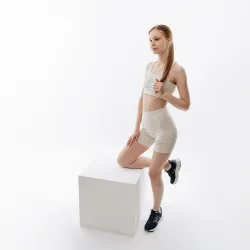 Жіночий Топ New Balance Essentials Reimagined Bra Бежевий L (7dWB31500MBM L) - Robinzon.ua