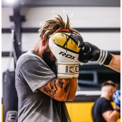 Боксерские перчатки RDX F7 Ego Golden 10 унций (капа в комплекте) - Robinzon.ua